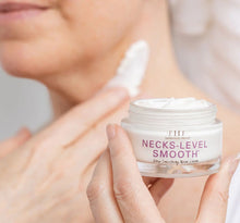 Load image into Gallery viewer, Necks-Level Smooth ultra smoothing neck cream by Framhouse Fresh Goods | Canada Glow Day Spa_Model_applying _cream
